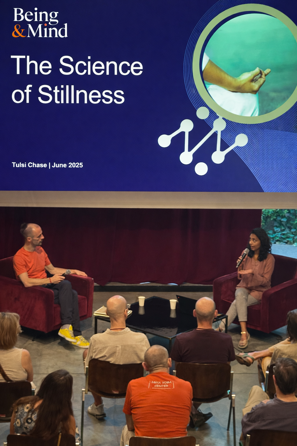 Tulsi presenting on the Science of Stillness